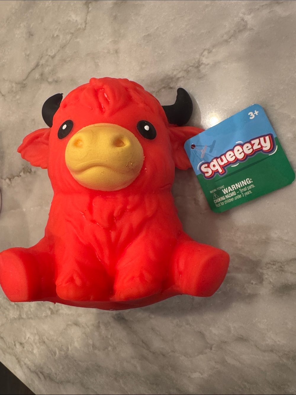 SMITH Orange Plush Squeezy Animal with Yellow Snout and Black Horns